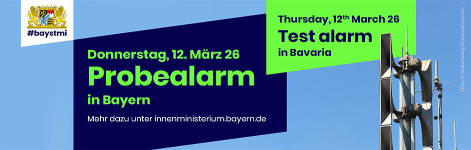 Foto zeigt Grafik mit Aufschrift Probealarm in Bayern am 12. März - externe Verlinkung auf Internetseite des StMI